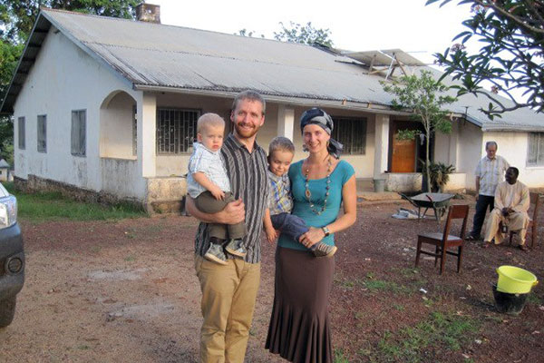 The Kuhns pose at their house in Galim, May 14. (Photo by Nizaa speaking Pastor Ousmanou Diedonné)