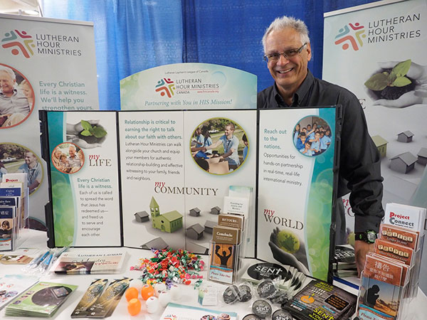 Executive Director Stephen Klink and the LLL Canada display.