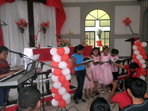 A group of students perform during the Reformation Day service.