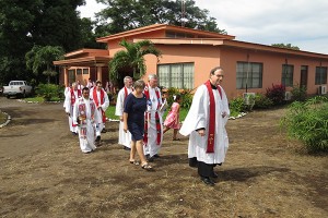 President Bugbee leads the procession into the installation service.