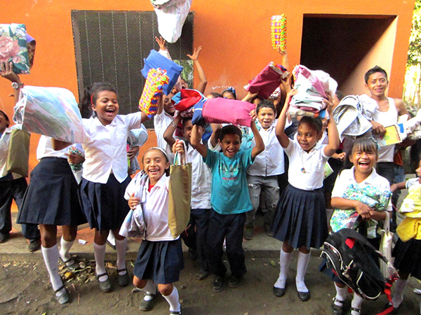 Children in Nicaragua celebrate after receiving gifts through CLWR's We Care program.