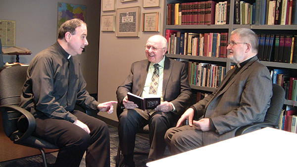 Left to right: LCC President Robert Bugbee, Rev. Dr. Norman Threinen, and Rev. Dr. Wilhelm Torgerson discuss the transition in leadership for Ukraine's seminary.