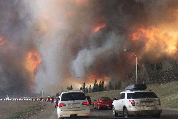Bumper to bumper traffic as Fort McMurray residents flee wildfire.