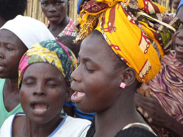 Mozambican women sing.