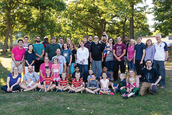 Faculty, students, and family at CLTS' opening barbecue.
