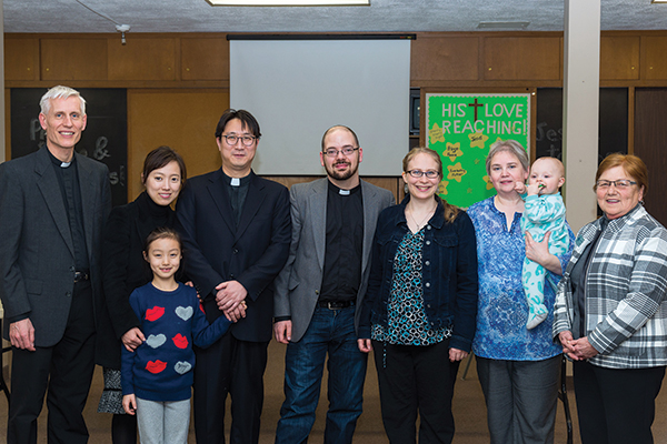 Rev. Dr. Thomas Winger; Terri, Sophia, and Isaac Paik; Matthew and Laurin Fenn; Iris Barta with Isaac Fenn; and Janice Buchner.