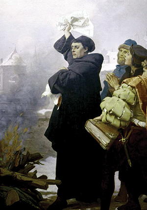 Luther burns the papal bull. (Detail from 1872 painting by Paul Thumann).